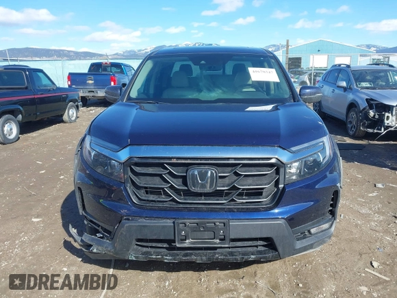2022 Honda Ridgeline RTL-E with VIN 5FPYK3F71NB013522, listed as a IAAI auction lot 41670347 with 24,689 mi miles and . Bid and sale history available at DreamBid. Image 12.
