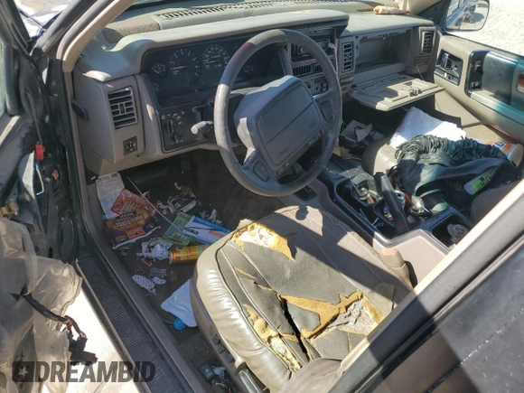 1993 Jeep Grand Cherokee Limited with VIN 1J4GZ78S3PC502345, listed as a Copart auction lot 46933805 with 121,652 mi miles and Salvage title. Bid and sale history available at DreamBid. Image 8.