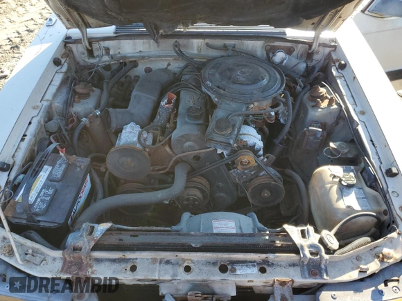 1986 Ford Mustang z VIN NOVIN42794605, wystawiony jako Copart lot #42794605 z przebiegiem 62 794 mil mil oraz Nie do naprawy • Non repairable. Historia ofert i sprzedaży dostępna na DreamBid. Obrazek 11.