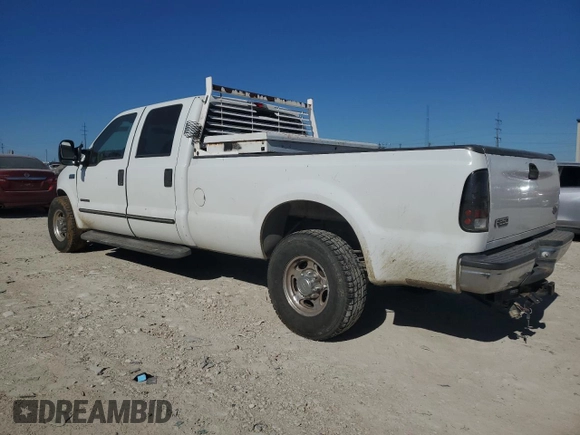 2000 Ford F-350 XL with VIN 3FTSW30F7YMA72223, listed as a Copart auction lot 81574774 with 203,727 mi miles and Salvage Title. Bid and sale history available at DreamBid. Image 2.