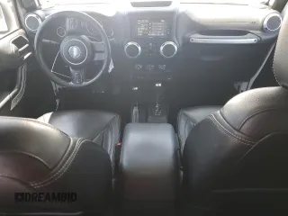2015 Jeep Wrangler Unlimited Rubicon с VIN 1C4BJWFG3FL771508, выставлен на аукционе Copart как лот 62006295 с пробегом 108 128 миль миль и Списание • Salvage title. История ставок и продаж доступна на DreamBid. Изображение 8.