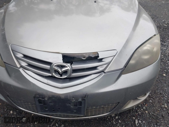2006 Mazda 3 S Grand Touring z VIN JM1BK344561456189, wystawiony jako IAAI lot #42459158 z przebiegiem 167 794 mil mil oraz . Historia ofert i sprzedaży dostępna na DreamBid. Obrazek 6.