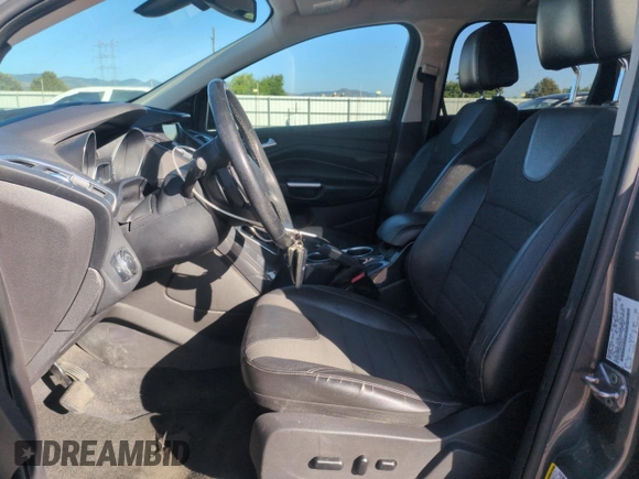 2013 Ford Escape Titanium with VIN 1FMCU0J93DUA78278, listed as a Copart auction lot 63519845 with 141,874 mi miles and Salvage title. Bid and sale history available at DreamBid. Image 7.