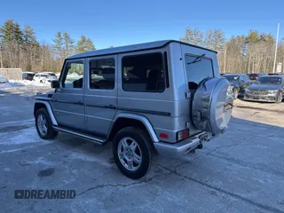 2003 Mercedes-Benz G-Class with VIN WDCYR49E23X141382, listed as a IAAI auction lot 41654677 with 329,762 mi miles. Bid and sale history available at carsss.com. Image 3.