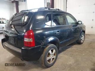 2006 Hyundai Tucson GL with VIN KM8JM12B96U252484, listed as a IAAI auction lot 42100855 with 273,655 mi miles. Bid and sale history available at carsss.com. Image 4.