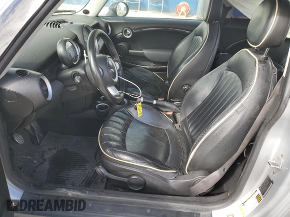 2008 MINI Hardtop S with VIN WMWMF73598TT87302, listed as a Copart auction lot 54273535 with 150,683 mi miles and Salvage Title. Bid and sale history available at DreamBid. Image 7.