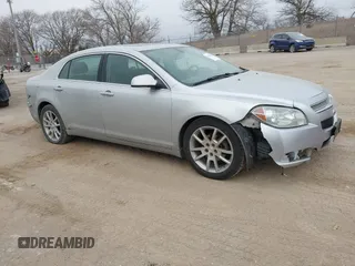 2012 Chevrolet Malibu LTZ with VIN 1G1ZG5E79CF264351, listed as a IAAI auction lot 41465508 with 213,854 mi miles and . Bid and sale history available at DreamBid. Image 1.