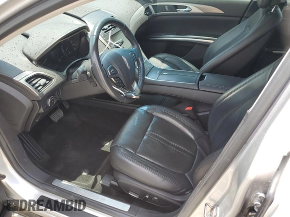 2013 Lincoln MKZ с VIN 3LN6L2JK5DR823005, выставлен на аукционе Copart как лот 60849765 с пробегом 78 318 миль миль и Списание • Salvage title. История ставок и продаж доступна на DreamBid. Изображение 7.