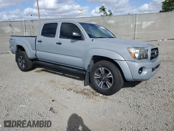 2008 Toyota Tacoma PreRunner with VIN 3TMKU72N28M017714, listed as a Copart auction lot 56787395 with 209,832 mi miles and Salvage title. Bid and sale history available at DreamBid. Image 4.