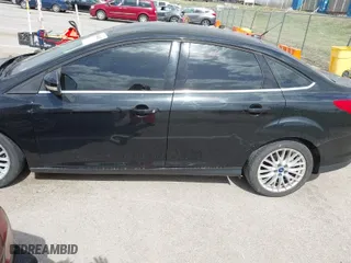 2012 Ford Focus SEL with VIN 1FAHP3H22CL284763, listed as a IAAI auction lot 41824652 with 178,451 mi miles. Bid and sale history available at carsss.com. Image 6.