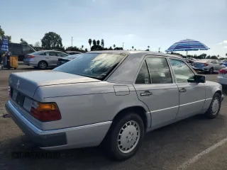 1990 Mercedes-Benz 300 with VIN WDBEA30D7LB246817, listed as a Copart auction lot 71825934 with 120,489 mi miles and Salvage Title. Bid and sale history available at carsss.com. Image 3.