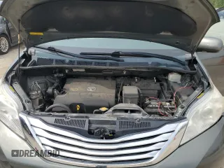 2011 Toyota Sienna XLE AAS z VIN 5TDYK3DC9BS046073, wystawiony jako Copart lot #57030305 z przebiegiem 246 956 mil mil oraz Szkoda całkowita • Salvage title. Historia ofert i sprzedaży dostępna na DreamBid. Obrazek 11.