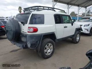 2014 Toyota FJ Cruiser with VIN JTEBU4BF7EK177741, listed as a IAAI auction lot 41871477 with 195,262 mi miles. Bid and sale history available at carsss.com. Image 4.