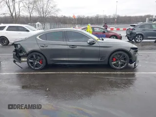 2023 Genesis G70 3.3T with VIN KMTG54TEXPU107334, listed as a IAAI auction lot 41565440 with 19,816 mi miles and . Bid and sale history available at carsss.com. Image 13.