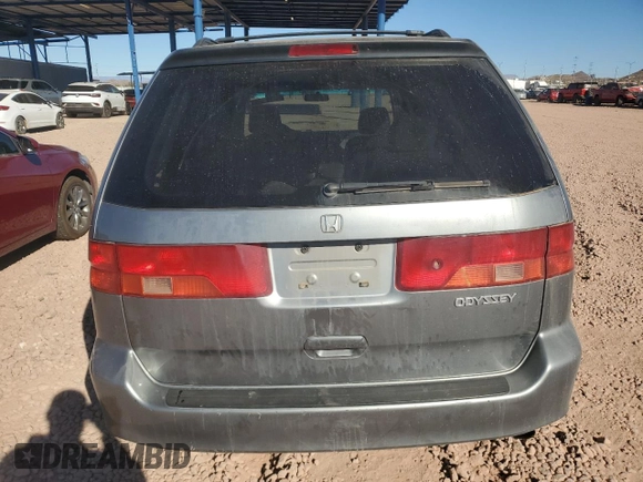 1999 Honda Odyssey EX with VIN 2HKRL1860XH541737, listed as a Copart auction lot 88897965 with 112,164 mi miles and Salvage title. Bid and sale history available at DreamBid. Image 6.