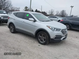 2018 Hyundai Santa Fe 2.4L z VIN 5XYZTDLB1JG526734, wystawiony jako IAAI lot #41565115 z przebiegiem 111 535 mil mil oraz . Historia ofert i sprzedaży dostępna na DreamBid. Obrazek 1.