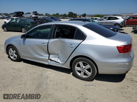 2012 Volkswagen Jetta TDI with VIN 3VWLL7AJ4CM325799, listed as a Copart auction lot 61835265 with 153,404 mi miles and Salvage title. Bid and sale history available at DreamBid. Image 2.