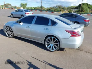 2014 Nissan Altima S with VIN 1N4AL3AP8EN343583, listed as a IAAI auction lot 41989981 with 103,012 mi miles and . Bid and sale history available at DreamBid. Image 3.