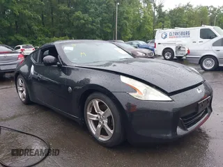 2012 Nissan 370Z z VIN JN1AZ4EH7CM561988, wystawiony jako IAAI lot #42343817 z przebiegiem 162 111 mil mil oraz . Historia ofert i sprzedaży dostępna na DreamBid. Obrazek 1.