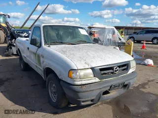 2002 Mazda B-Series 2WD Truck SX with VIN 4F4YR12D42TM18276, listed as a IAAI auction lot 41723184 with 142,623 mi miles. Bid and sale history available at carsss.com. Image 1.