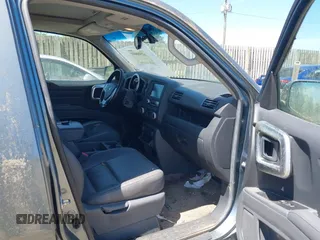2007 Honda Ridgeline RTL z VIN 2HJYK16527H541865, wystawiony jako IAAI lot #42550602 z przebiegiem 160 703 mil mil oraz . Historia ofert i sprzedaży dostępna na DreamBid. Obrazek 5.