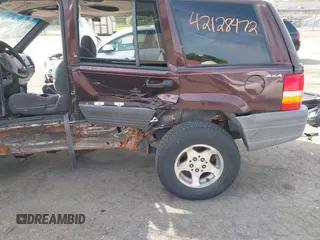 1998 Jeep Grand Cherokee Laredo с VIN 1J4GZ58S1WC103355, выставлен на аукционе IAAI как лот 42128472 с пробегом Не указан миль и . История ставок и продаж доступна на DreamBid. Изображение 15.