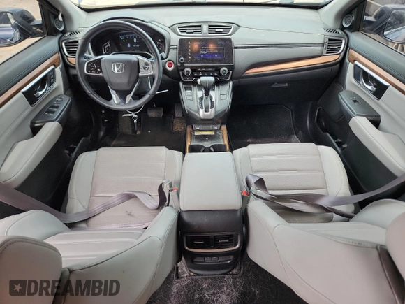 2020 Honda CR-V Touring с VIN 2HKRW2H9XLH631074, выставлен на аукционе Copart как лот 62957255 с пробегом 21 460 миль миль и Списание • Salvage title. История ставок и продаж доступна на DreamBid. Изображение 8.