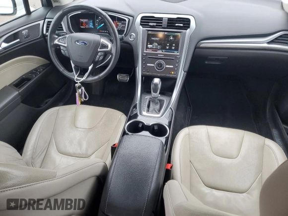 2016 Ford Fusion Titanium with VIN 3FA6P0K9XGR392339, listed as a Copart auction lot 82372914 with 130,953 mi miles and Salvage Title. Bid and sale history available at carsss.com. Image 8.