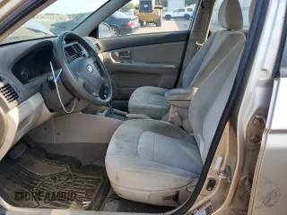 2008 Kia Spectra EX with VIN KNAFE121085524056, listed as a Copart auction lot 71218854 with 128,944 mi miles and Salvage Title. Bid and sale history available at carsss.com. Image 7.