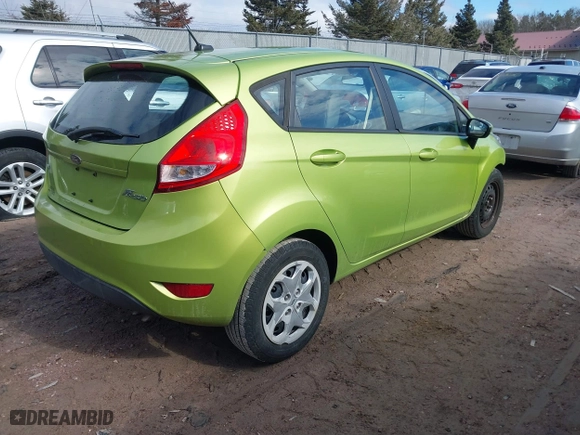 2011 Ford Fiesta SE with VIN 3FADP4EJ2BM113623, listed as a IAAI auction lot 41685229 with 137,954 mi miles. Bid and sale history available at carsss.com. Image 4.