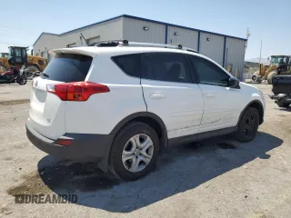2014 Toyota RAV4 LE with VIN JTMZFREV7EJ018804, listed as a Copart auction lot 62738795 with 97,265 mi miles and Salvage title. Bid and sale history available at DreamBid. Image 3.