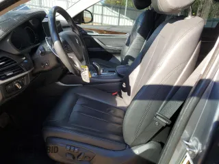 2015 BMW X6 sDrive35i with VIN 5UXKU0C57F0F91930, listed as a Copart auction lot 75622864 with 145,516 mi miles and Salvage Title. Bid and sale history available at carsss.com. Image 7.