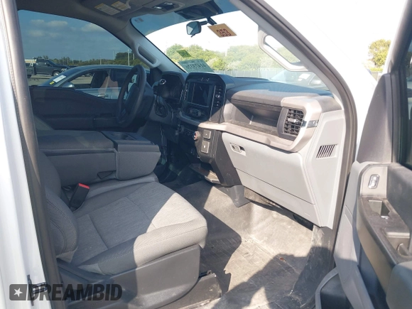 2023 Ford F-150 XL with VIN 1FTMF1CP7PKG21586, listed as a IAAI auction lot 41473326 with 19,008 mi miles and . Bid and sale history available at carsss.com. Image 5.