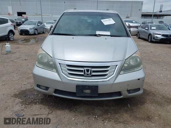 2009 Honda Odyssey Touring z VIN 5FNRL38979B052923, wystawiony jako IAAI lot #42427207 z przebiegiem 201 483 mil mil oraz . Historia ofert i sprzedaży dostępna na DreamBid. Obrazek 12.