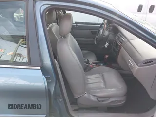 2005 Mercury Sable LS with VIN 1MEFM55S65A611575, listed as a IAAI auction lot 41535836 with 98,932 mi miles and . Bid and sale history available at carsss.com. Image 5.