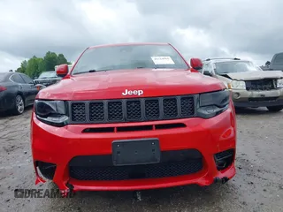 2017 Jeep Grand Cherokee SRT z VIN 1C4RJFDJXHC670370, wystawiony jako IAAI lot #41524965 z przebiegiem 87 276 mil mil oraz . Historia ofert i sprzedaży dostępna na DreamBid. Obrazek 13.
