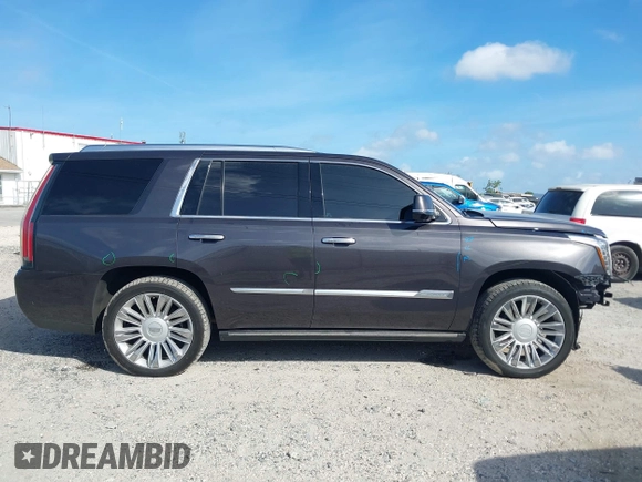 2017 Cadillac Escalade Premium Luxury z VIN 1GYS4CKJ5HR293450, wystawiony jako IAAI lot #41951478 z przebiegiem 51 882 mil mil oraz . Historia ofert i sprzedaży dostępna na DreamBid. Obrazek 14.