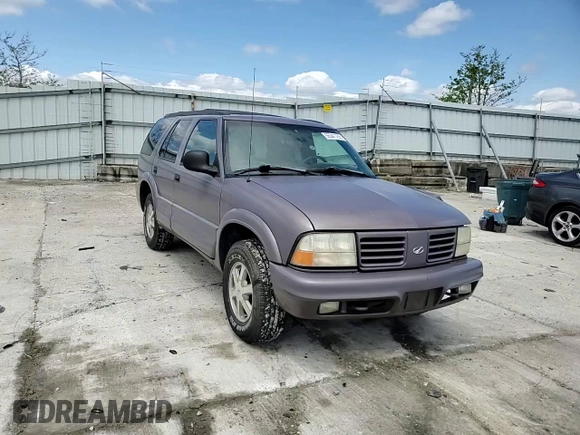 1998 Oldsmobile Bravada z VIN 1GHDT13W9W2718457, wystawiony jako Copart lot #55341755 z przebiegiem 133 968 mil mil oraz Tytuł czysty. Historia ofert i sprzedaży dostępna na DreamBid. Obrazek 15.