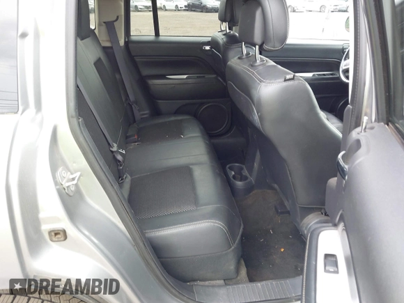 2017 Jeep Compass Latitude with VIN 1C4NJDEB0HD112001, listed as a IAAI auction lot 42352409 with 151,352 mi miles and . Bid and sale history available at DreamBid. Image 8.