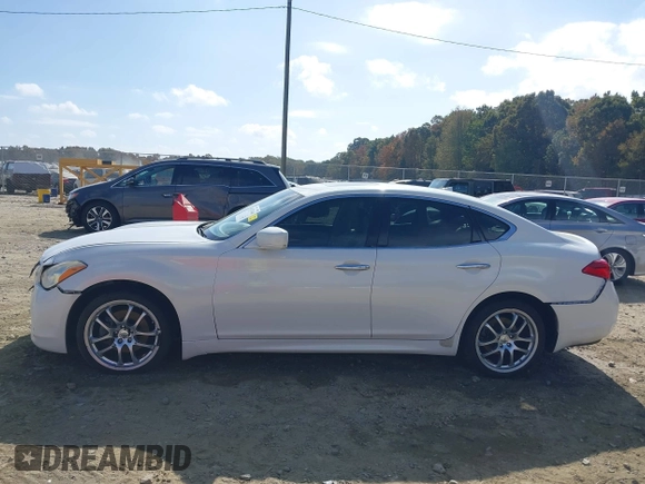2012 Infiniti M37 with VIN JN1BY1AP6CM333466, listed as a IAAI auction lot 40723440 with 156,102 mi miles. Bid and sale history available at carsss.com. Image 14.