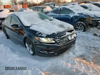 2014 Volkswagen CC Sport with VIN WVWBN7AN9EE505056, listed as a Copart auction lot 87305504 with 168,585 mi miles and Salvage Title. Bid and sale history available at carsss.com. Image 10.