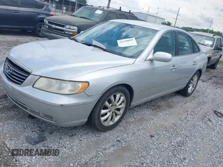 2007 Hyundai Azera SE with VIN KMHFC46F97A215820, listed as a IAAI auction lot 42120029 with 211,069 mi miles. Bid and sale history available at carsss.com. Image 2.