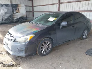 2012 Subaru Impreza Sedan 2.0i Premium with VIN JF1GJAB60CH002121, listed as a IAAI auction lot 41652837 with 106,382 mi miles. Bid and sale history available at carsss.com. Image 17.