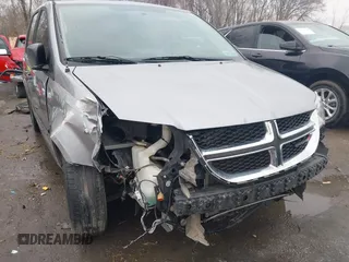 2014 Dodge Grand Caravan American Value with VIN 2C4RDGBG9ER187198, listed as a IAAI auction lot 41669334 with 204,803 mi miles and . Bid and sale history available at DreamBid. Image 6.