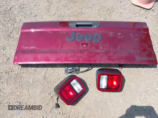 2021 Jeep Gladiator Sport S with VIN 1C6HJTAG8ML542343, listed as a IAAI auction lot 42317089 with 56,354 mi miles and . Bid and sale history available at DreamBid. Image 12.
