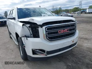 2015 GMC Yukon XL SLT with VIN 1GKS1HKC7FR126375, listed as a IAAI auction lot 41689017 with 218,622 mi miles. Bid and sale history available at carsss.com. Image 6.