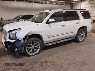 2015 GMC Yukon SLE with VIN 1GKS2AKC6FR103447, listed as a IAAI auction lot 41596220 with 104,209 mi miles. Bid and sale history available at carsss.com. Image 21.