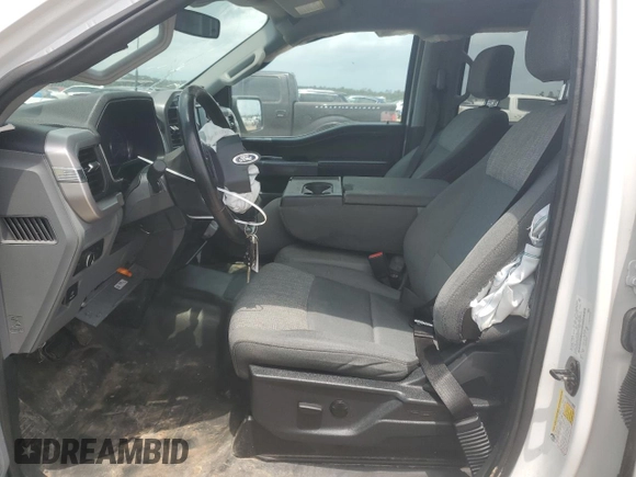 2022 Ford F-150 XL with VIN 1FTFW1E82NFA51713, listed as a Copart auction lot 54581755 with 69,966 mi miles and Salvage Title. Bid and sale history available at DreamBid. Image 7.