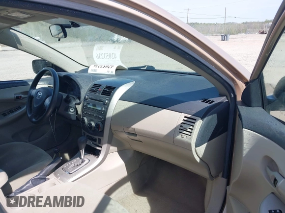 2011 Toyota Corolla L with VIN 2T1BU4EE1BC547635, listed as a IAAI auction lot 42053236 with 121,485 mi miles. Bid and sale history available at carsss.com. Image 5.
