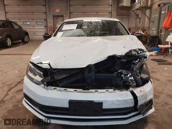 2015 Volkswagen Jetta Sedan 2.0L S with VIN 3VW2K7AJ1FM225534, listed as a IAAI auction lot 41941755 with 123,890 mi miles. Bid and sale history available at carsss.com. Image 12.